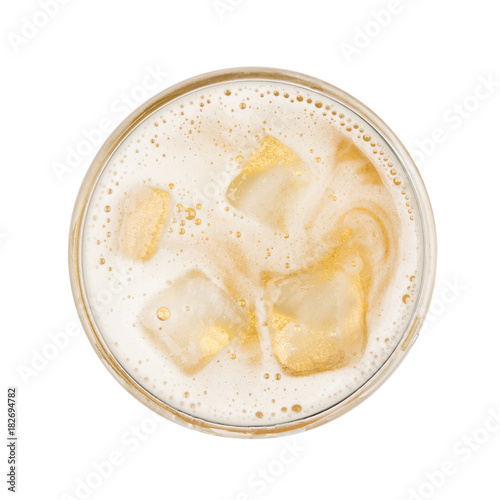 Mug of beer with bubble with ice on glass isolated on white background top view