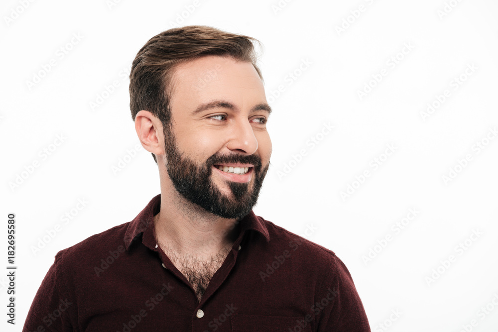 Portrait of a happy cheerful man laughing and looking away Portrait of a happy cheerful man laughing and looking away