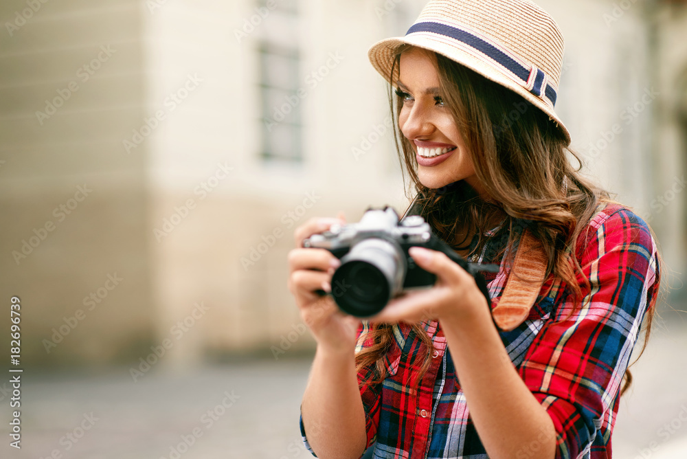 Beautiful Tourist Girl With Camera In Hands. Beautiful Tourist Girl With Camera In Hands.