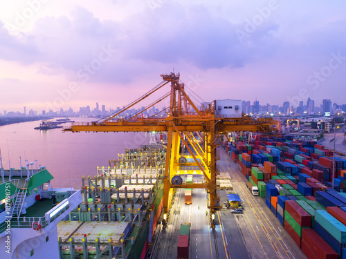 container,container ship in import export and business logistic,By crane,Trade Port , Shipping,cargo to harbor.Aerial view,Water transport,International,Shell Marine,transportation,logistic,trade,port