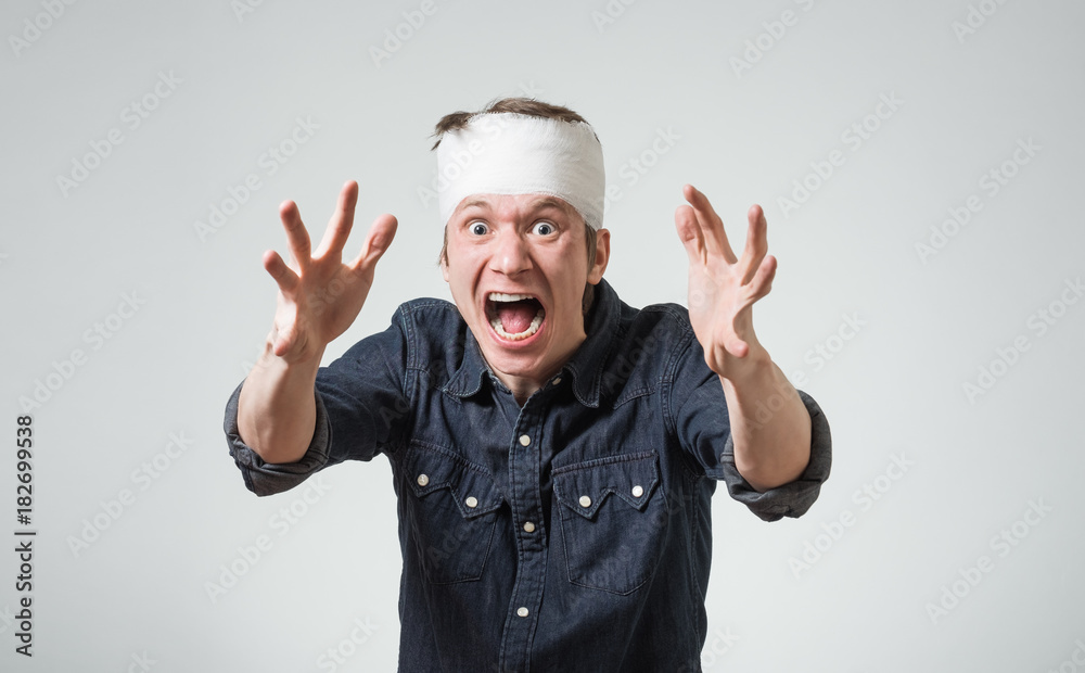 Man with bandage on his head Man with bandage on his head