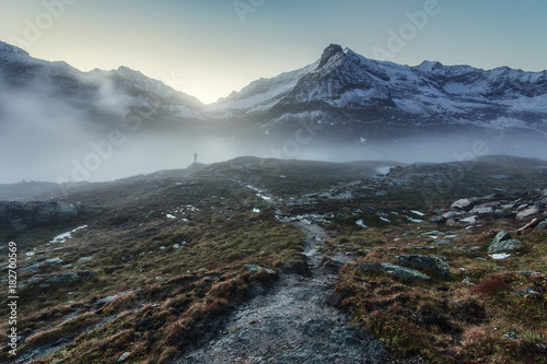 Mountain landscape covered with morning fog, Austria