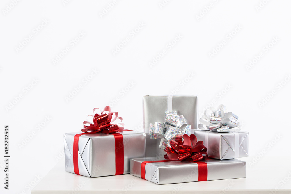 Obraz premium Silver boxes with gifts.