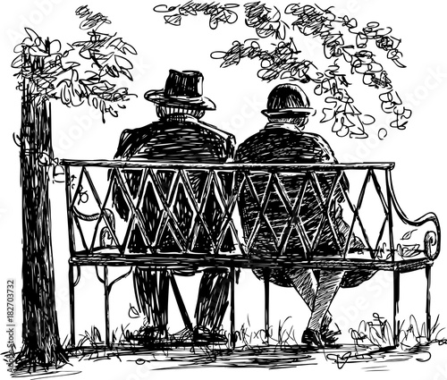 Elderly couple resting on a park bench