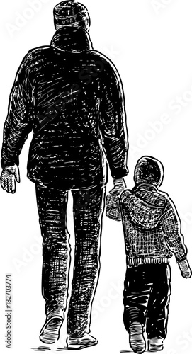 Father and his little son on a walk