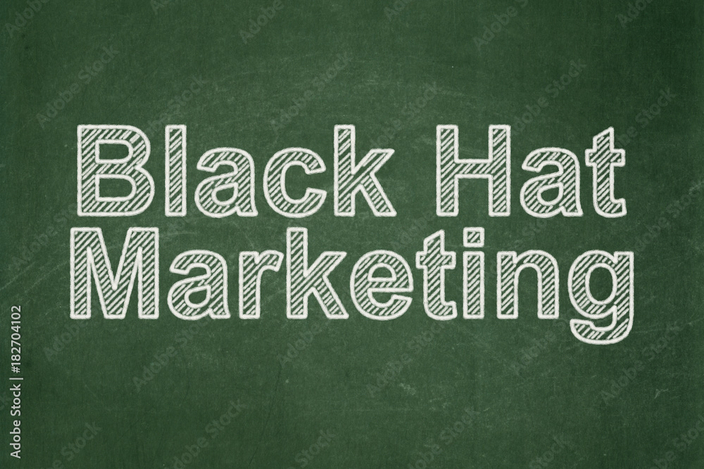 Obraz premium Advertising concept: text Black Hat Marketing on Green chalkboard background