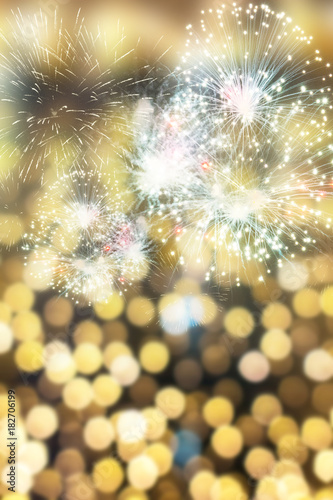 Abstract holiday background with New Year's fireworks and copy space