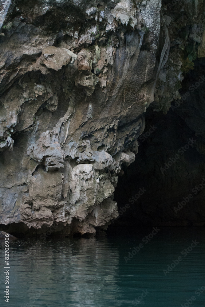 Beautiful stone in blue water at famous kong lor Beautiful stone in blue water at famous kong lor