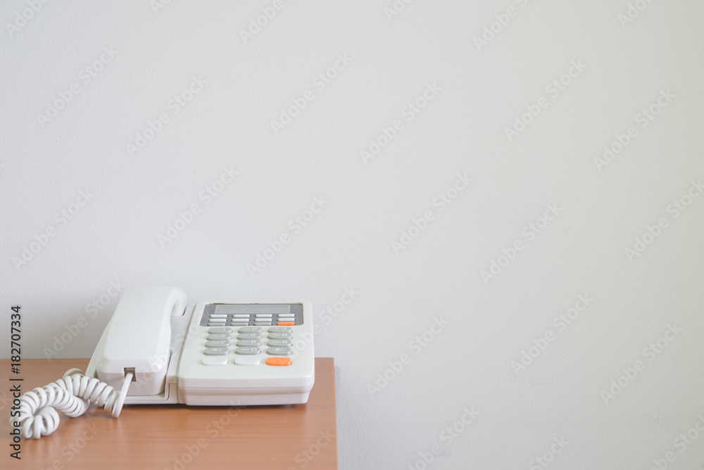 Telephone devices at office desk of customer service support concept for communication technology. Telephone devices at office desk of customer service support concept for communication technology.