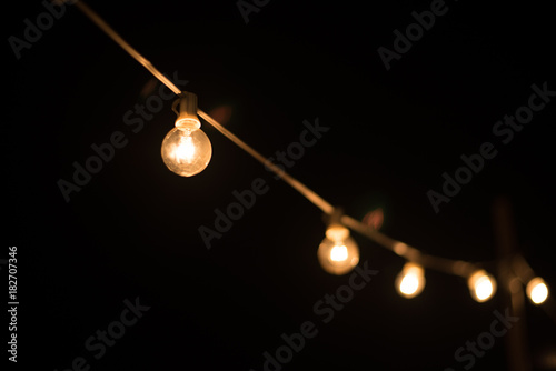 Wallpaper Mural Light bulb on brick wall background switched on. Torontodigital.ca