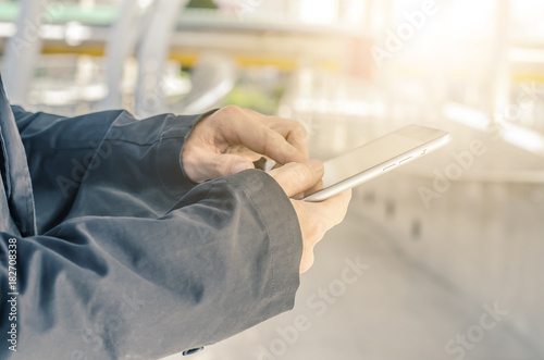 businessman hold tablet  technology  internet and networking concept - Close up image of business man holding a digital tablet planning business digital strategy achievement