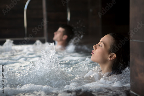 Couple relaxing in spa photo