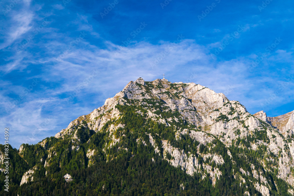 Panorama Bucegi Mountains and Heroes’ Cross on Caraiman from Busteni, Bucegi National Park, Southern Carpathians Mountains, Transylvania, Romania Panorama Bucegi Mountains and Heroes’ Cross on Caraiman from Busteni, Bucegi National Park, Southern Carpathians Mountains, Transylvania, Romania