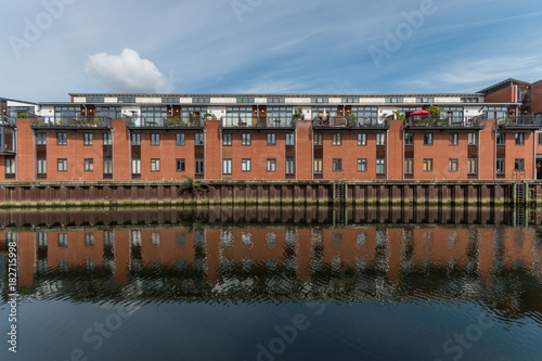 Reflection of flats on Fishergate in Norwich photo