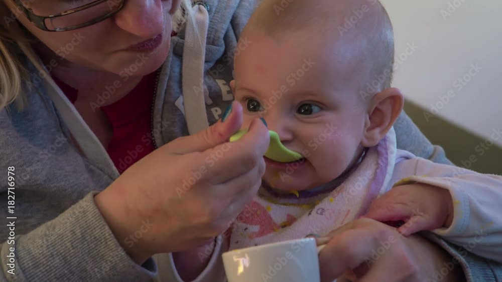 Cute baby girl hardly waiting to taste organic food for the first time. Cute baby girl hardly waiting to taste organic food for the first time.