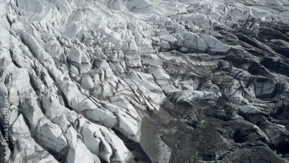 Aerial view of white and dirty glacier in Iceland Aerial view of white and dirty glacier in Iceland