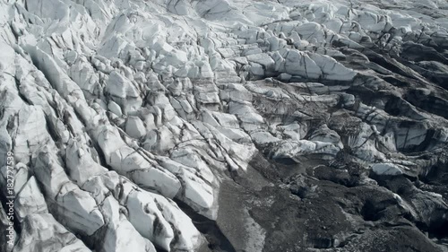 Aerial view of white and dirty glacier in Iceland