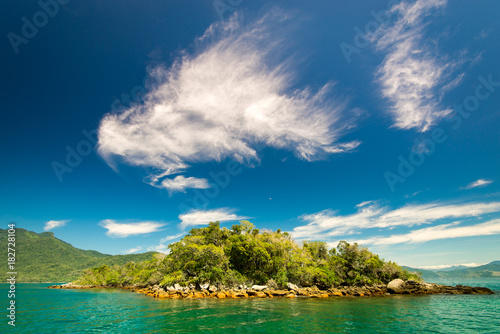 Small Island Near Brazilian Coast, With Turquoise Water and Clouds in the Blue Sky