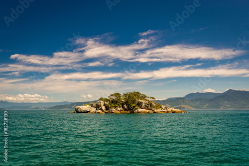 Small Island Near Brazilian Coast, With Turquoise Water and Clouds in the Blue Sky © Donatas Dabravolskas