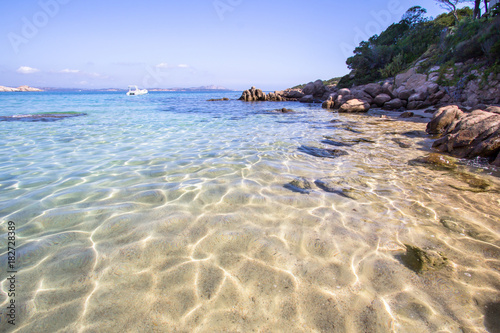 Tableau sur toile The beach at Baja Sardinia in Sardinia, italy