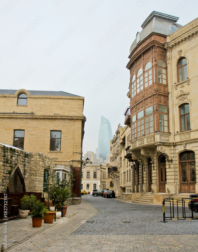 View at the old building on Sabir Street. The historical part of the city Baku. Ancient stone buildings.