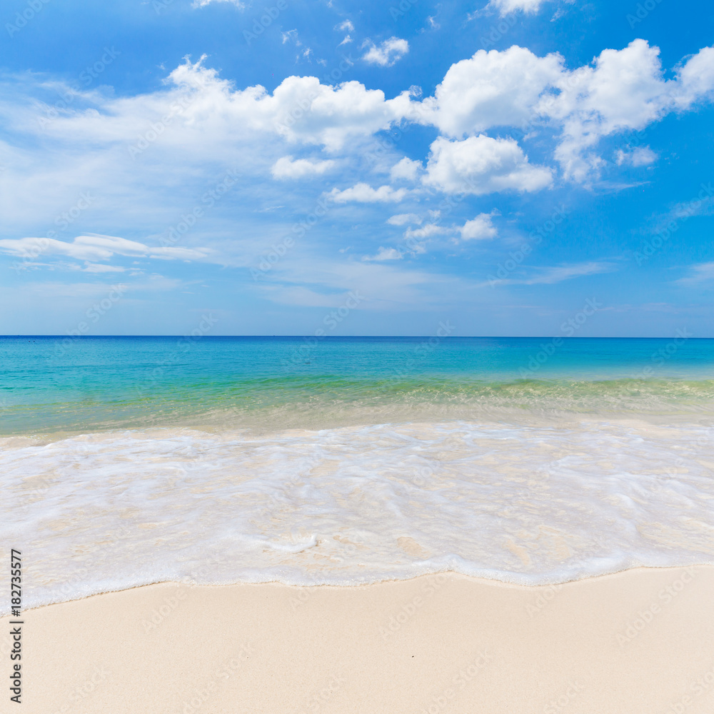 Sunny tropical beach with white sand and blue sky Sunny tropical beach with white sand and blue sky