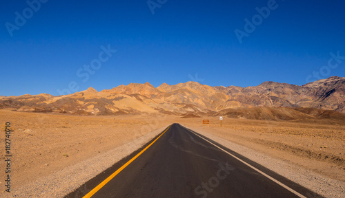 Road through the desert of Death Valley in California
