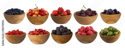 Collage of different fruits and berries isolated on white. Set of strawberries, raspberries, currants, blackberries, gooseberries and cherries. Background berry.