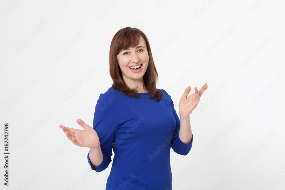Happy middle aged woman on white background. Blue blank shirt with copy space. Menopause. Mothers day. Education time Happy middle aged woman on white background. Blue blank shirt with copy space. Menopause. Mothers day. Education time