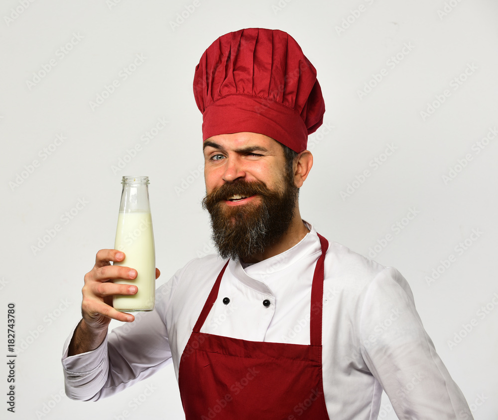 Chef with milkshake or yoghurt. Homemade food concept Chef with milkshake or yoghurt. Homemade food concept