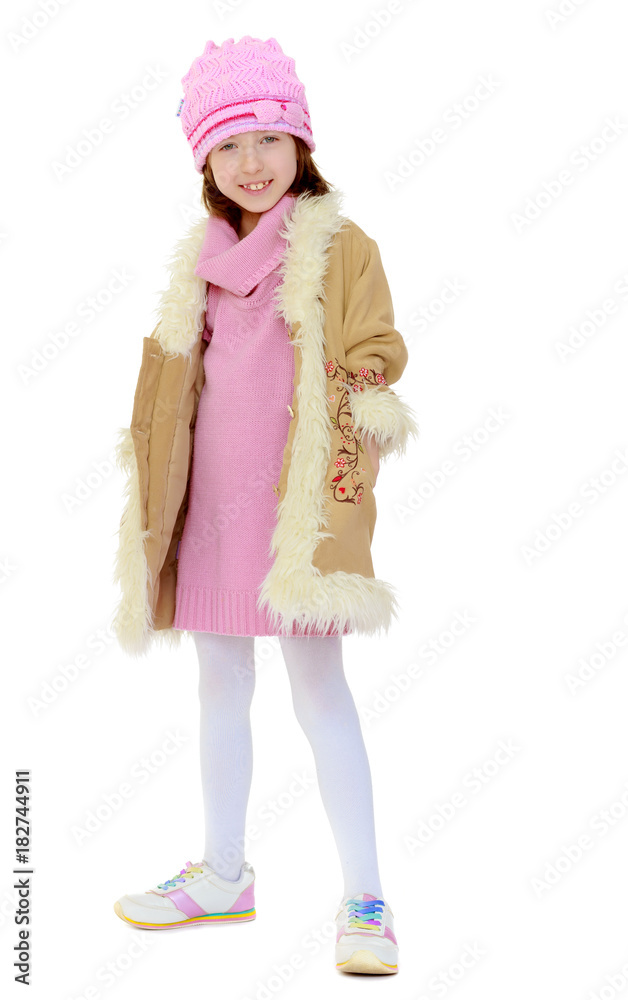 Beautiful little girl in winter coat with fur. Beautiful little girl in winter coat with fur.