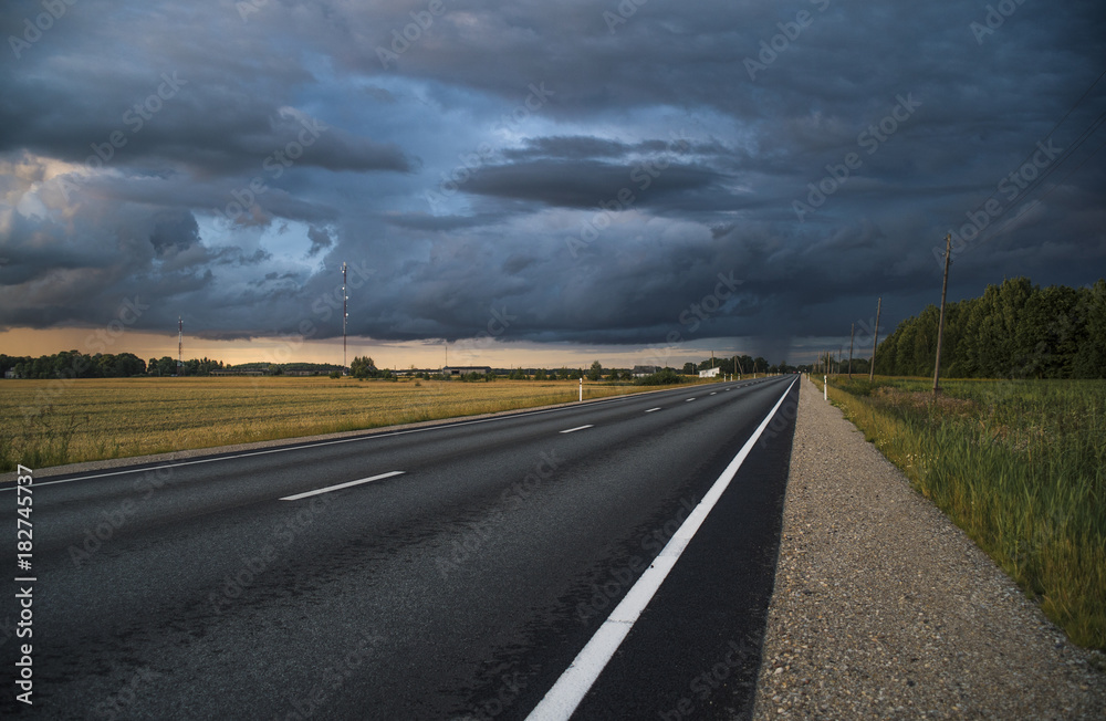Highway, dark clouds, storm Highway, dark clouds, storm