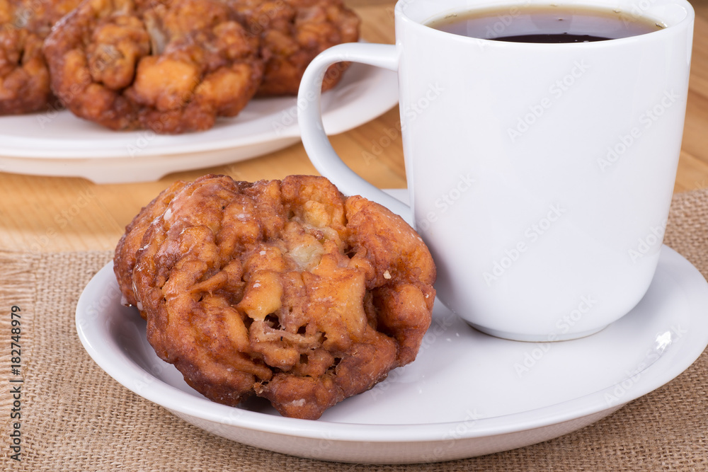 Glazed Apple Fritter and Cup of Coffee Glazed Apple Fritter and Cup of Coffee