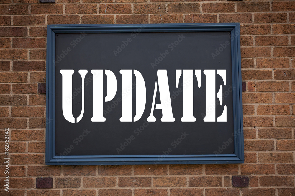 Obraz premium Conceptual hand writing text caption inspiration showing announcement Update. Business concept for Education Text knowledge study written on frame old brick background with copy space