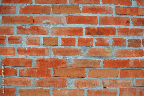 Wall from a red brick - background, texture. Brickwork