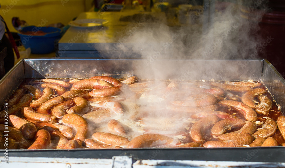 Grilling sausages at the folk festival