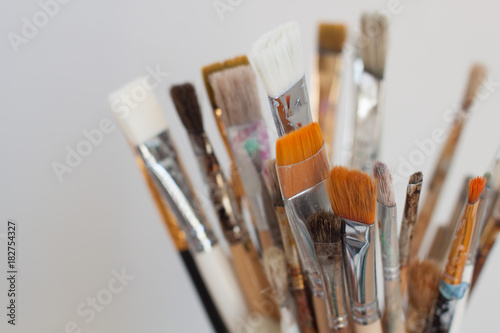Artist's working brushes. Selective focus.
