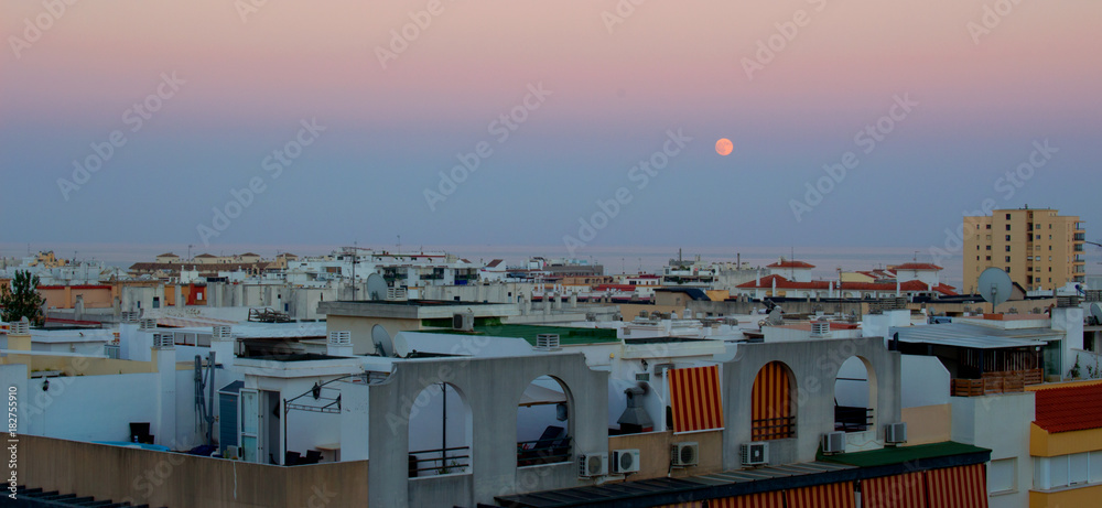 Sunset. Sunset sky and moon. Costa del Sol, Andalusia, Spain. 