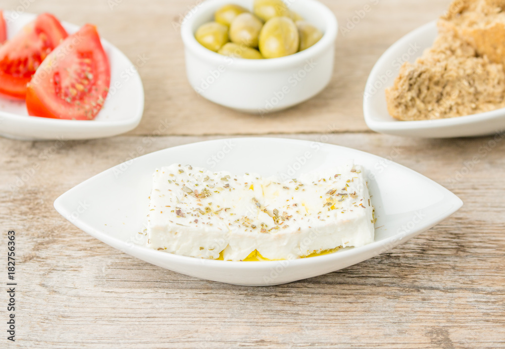 Greek Appetizers feta, tomatoes and rusks. Mediterranean traditional healthy food. Greek Appetizers feta, tomatoes and rusks. Mediterranean traditional healthy food.