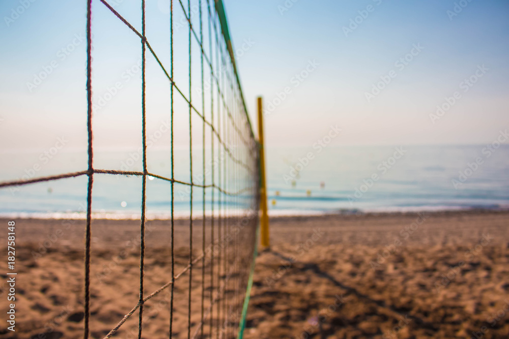 Beach view. Volleyball net on the beach. Costa del Sol, Andalusia, Spain.