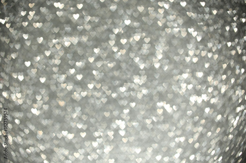 Beautiful silver heart bokeh background