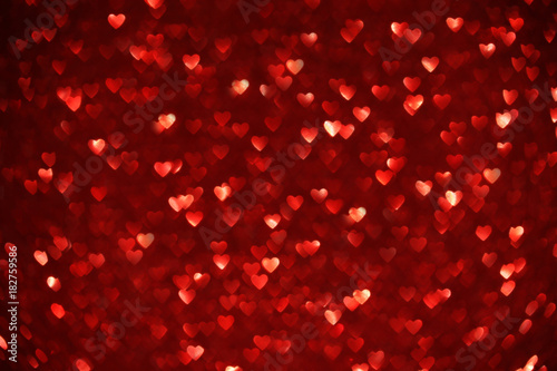 Beautiful red hearts bokeh background