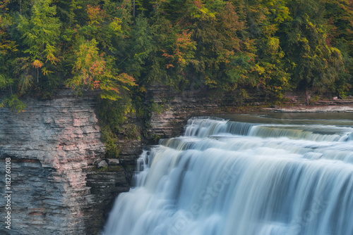 Waterfall surrounded by fall foliage in Upstate New York 