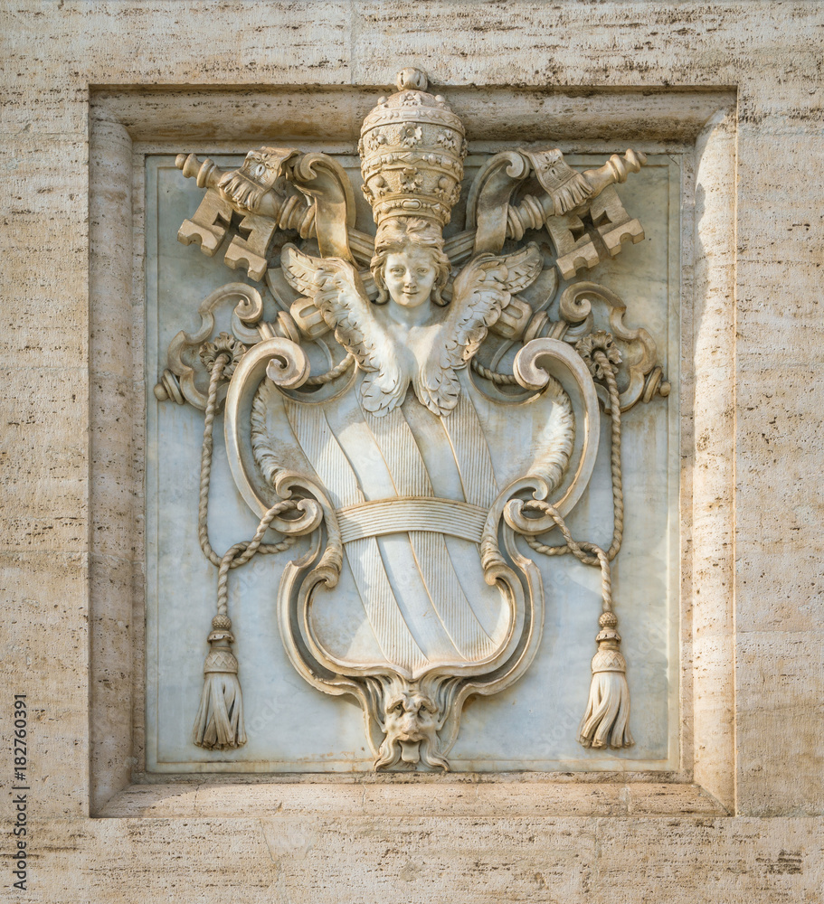 The arms of the Holy See under sede vacante, on the facade of the Basilica of Saint John Lateran in Rome, Italy.
