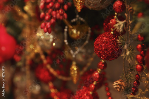Christmas blurred background in red and gold with beautiful bokeh and lights