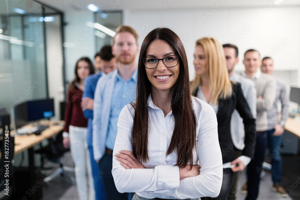 Group picture of business team posing in office Group picture of business team posing in office