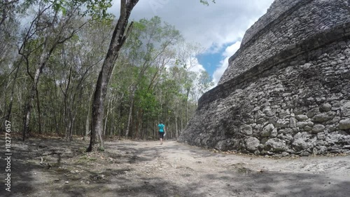 Tourist visiting the Ek Balam Mayan ruins in Mexico photo