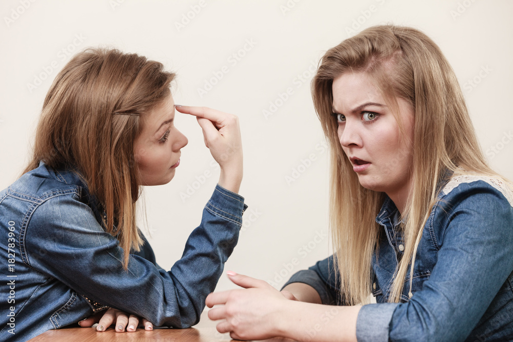 Two women having argue