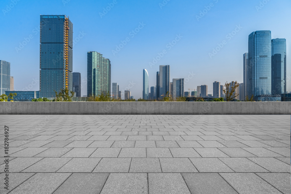 empty brick floor with cityscape and skyline.