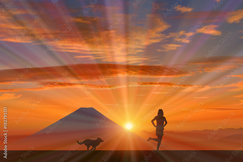 犬と女性に富士山と朝日